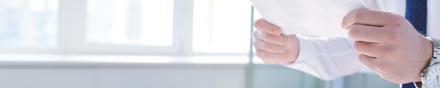student holding paper