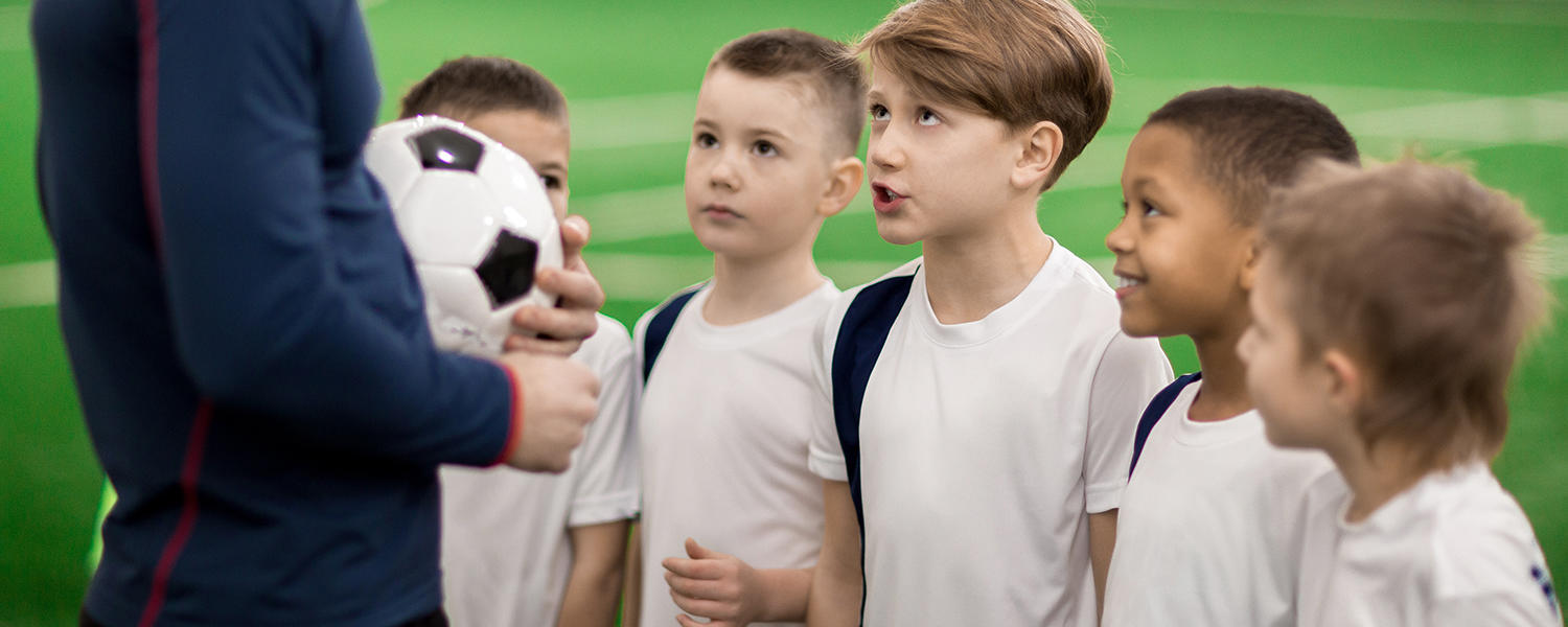 Kids talking to their coach