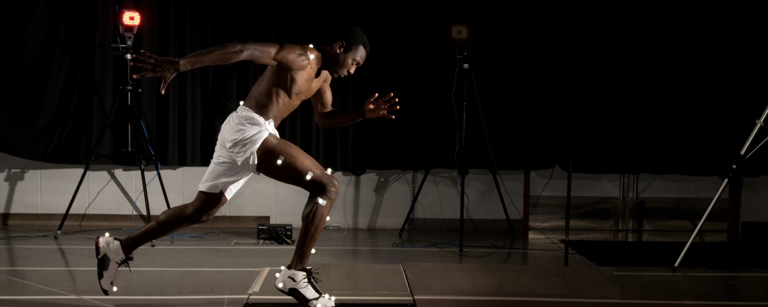 Man running in human performance lab