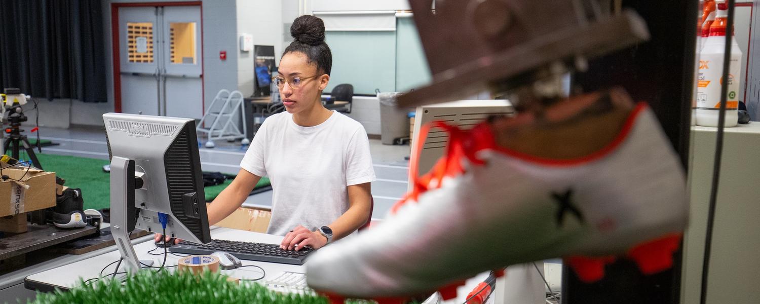 Student in the lab testing running shoes