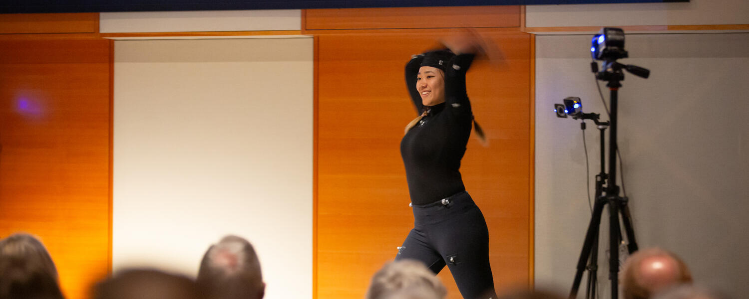 A student presenting dance science