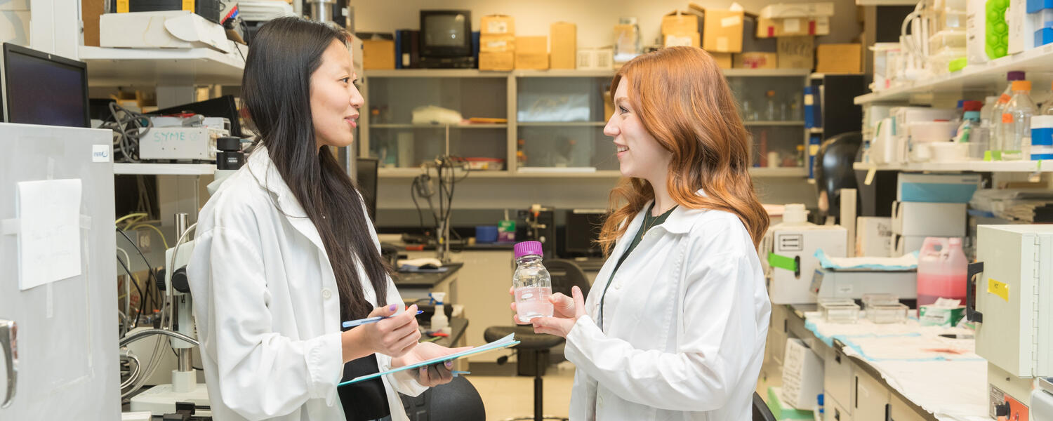 two students in the lab