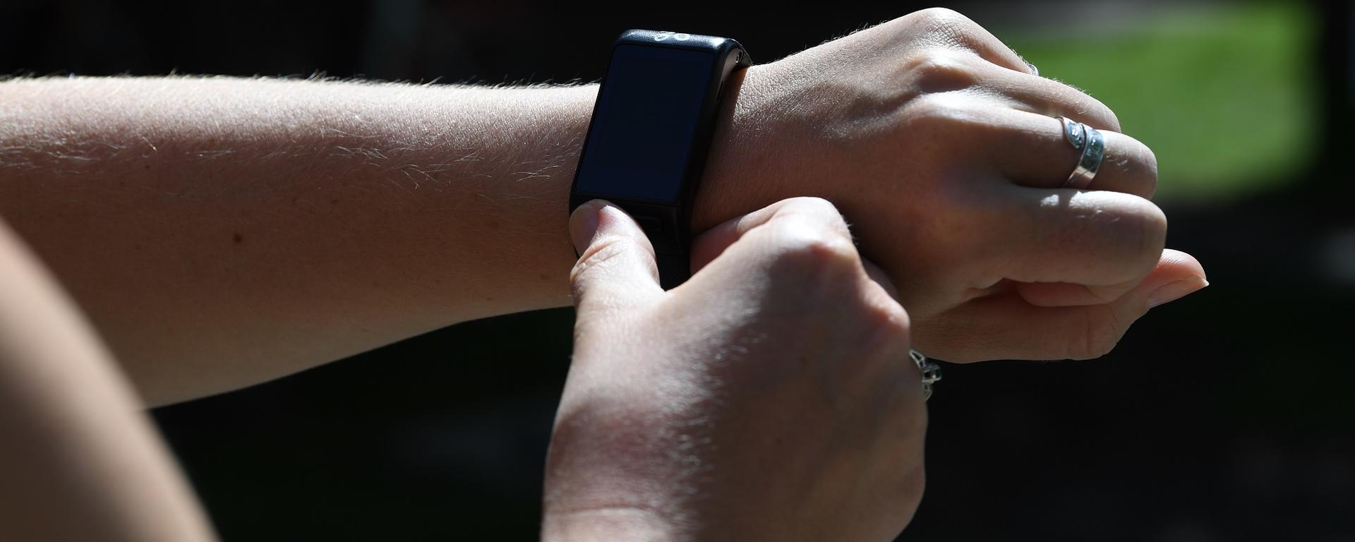 Person looking at smart watch