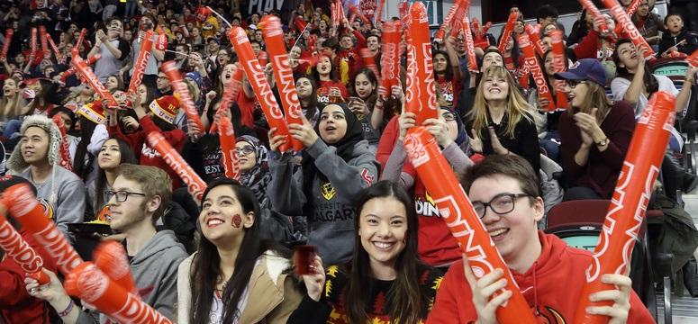 crowd cheering at Crowchild Classic hockey game