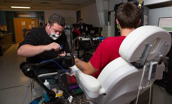Dr. Ryan Peters performing a test
