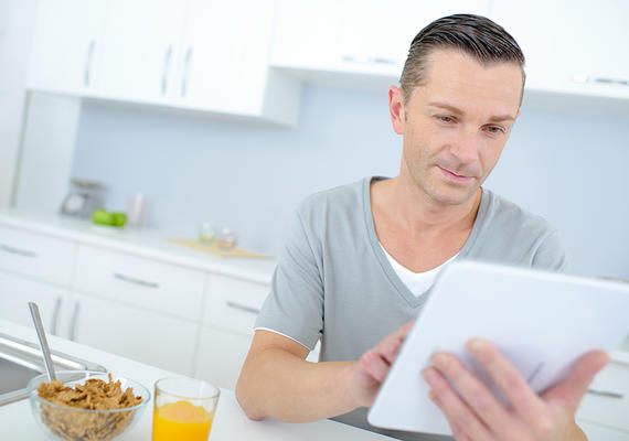 Man reading news on his mobile device