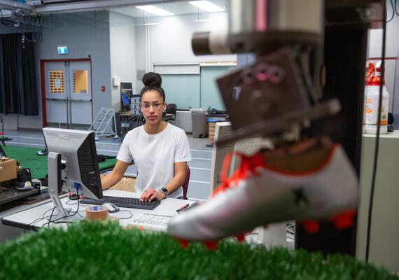 female researcher conducting shoe research