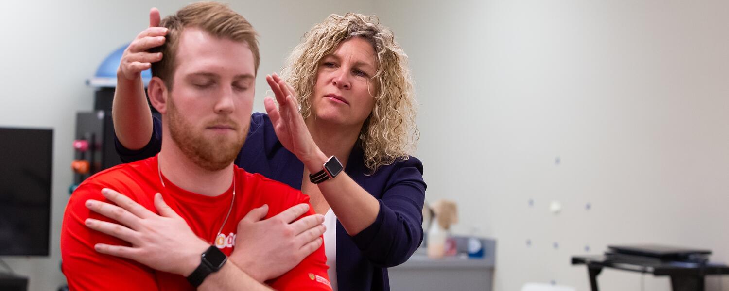 Dr. Kathryn Schneider in the concussion lab at the University of Calgary 