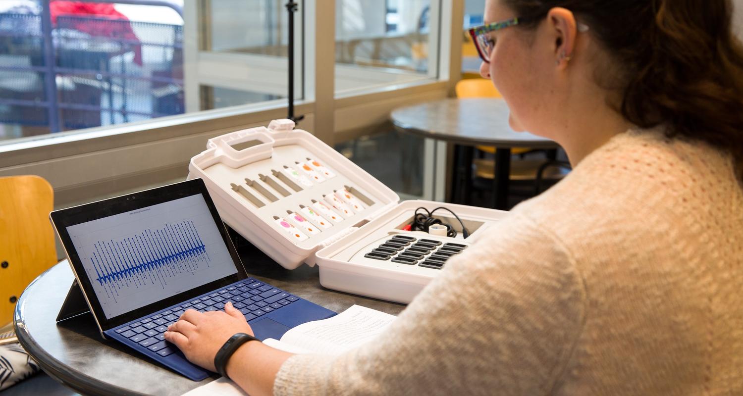 Woman working in the wearables lab at UCalgary 