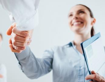 two people shaking hands